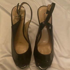 Chic Black Slingback Heels

Black Open Toe, Guess Pumps Size 7M